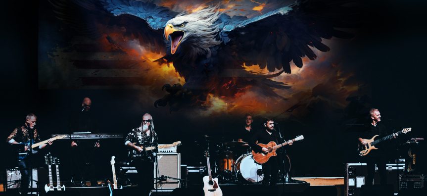Band members play under the banner of a flying eagle